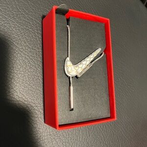 Silver Nike Necklace